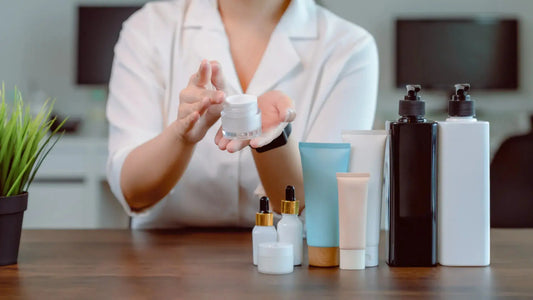 Cosmetic safety expert presenting a skincare cream with cosmetic bottles and serums for product assessment.