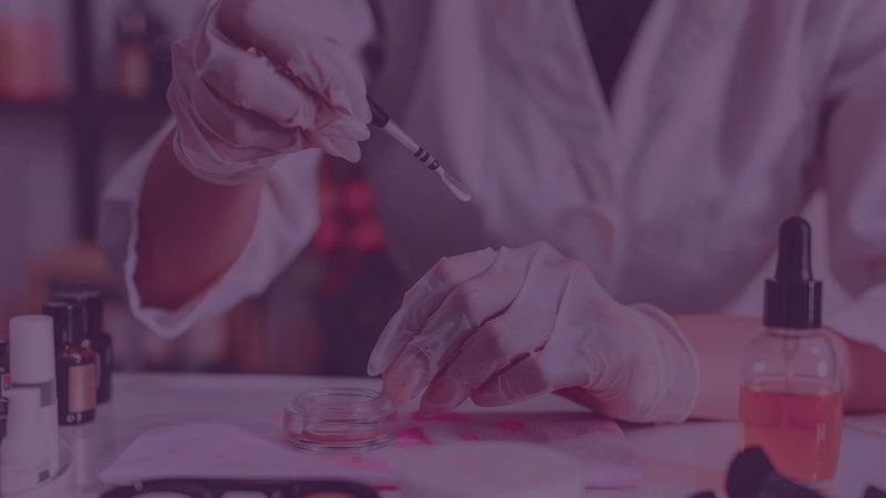 Cosmetic laboratory with beakers and skincare products